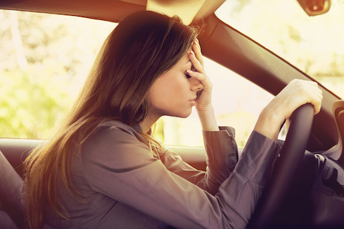 Woman in Car Stressed